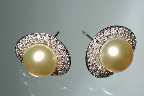 Appraisal: PAIR PEARL AND DIAMOND EARRINGS Pair of pearl and diamond