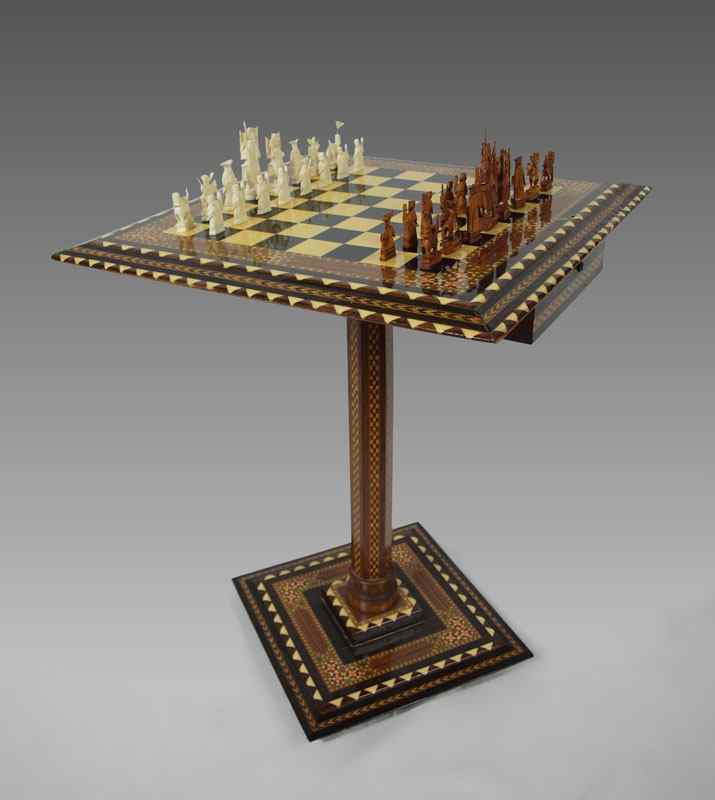 Appraisal: IVORY CHESS SET WITH PARQUETRY TABLE Complete ivory chess set