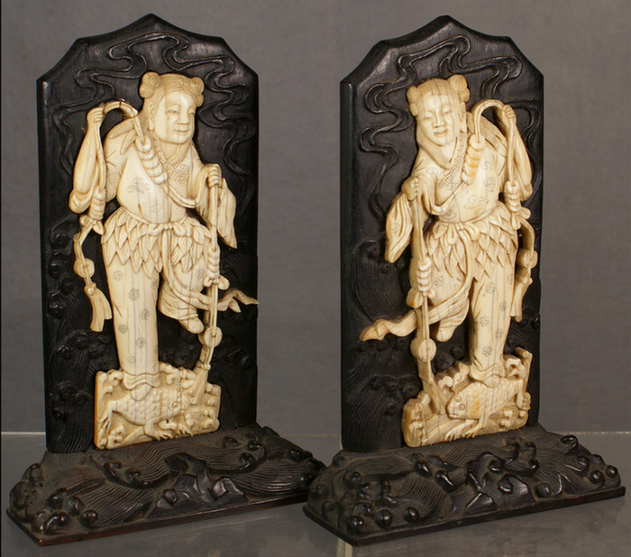 Appraisal: Pr fine Chinese carved ivory and teakwood bookends depicting Liu