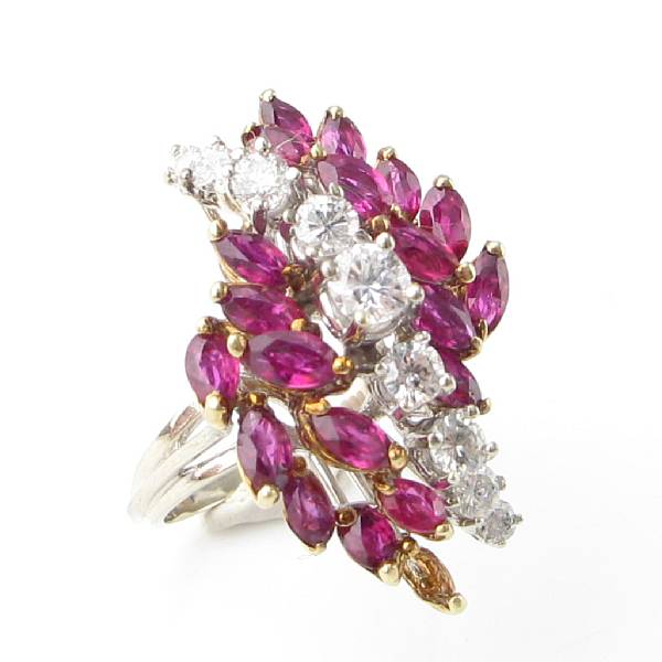 Appraisal: A ruby diamond and two-toned gold cluster ring one ruby