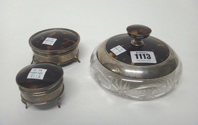 Appraisal: A silver and tortoiseshell lidded lady's circular faceted glass powder