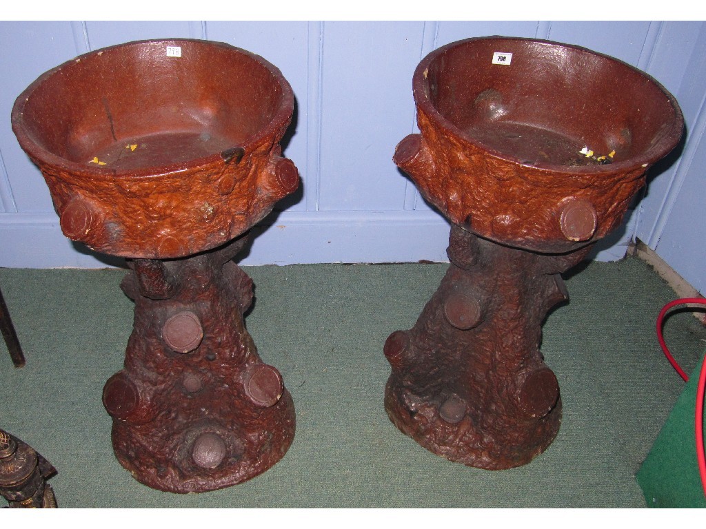 Appraisal: Pair of stoneware garden planters modelled as tree stumps