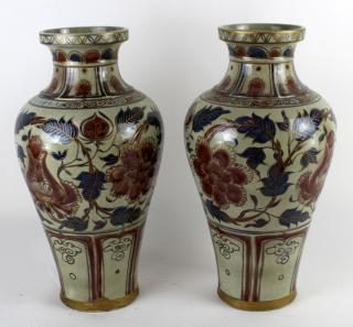 Appraisal: Pair of Chinese terra cotta vases with floral decoration h