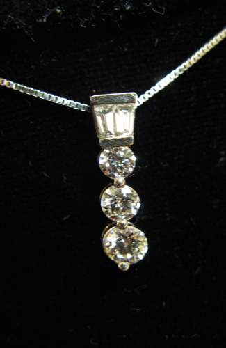 Appraisal: DIAMOND AND WHITE GOLD PENDANT NECKLACE the pendant K white