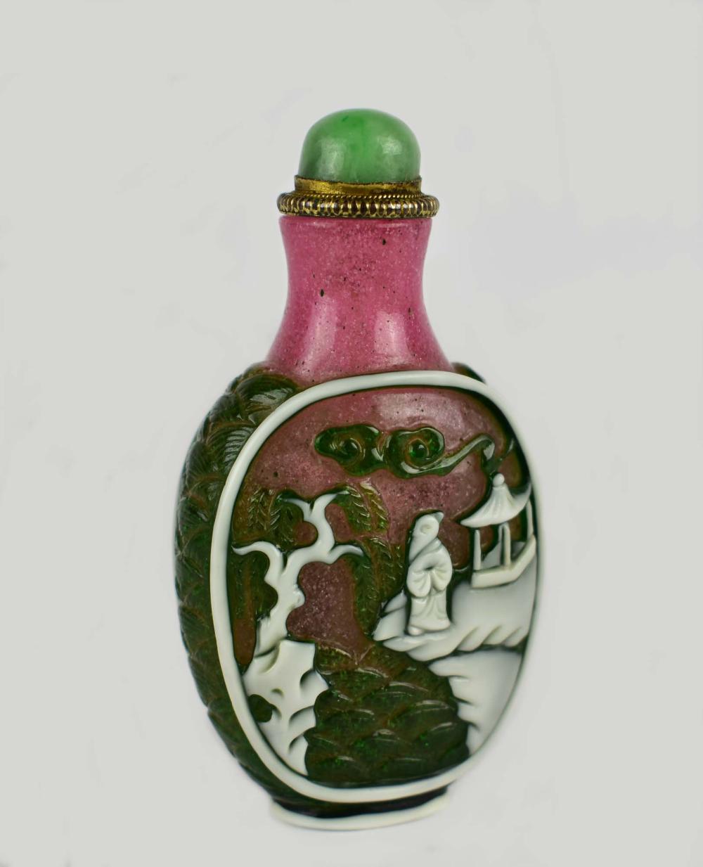 Appraisal: CHINESE TRICOLOR OVERLAID GLASS SNUFF BOTTLEThe baluster body overlaid with