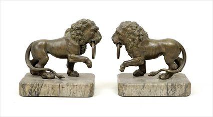 Appraisal: Pair of Patinated Metal Lion Figures on Marble Plinths x