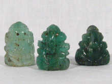 Appraisal: Three carved emeralds in the form of the elephant god