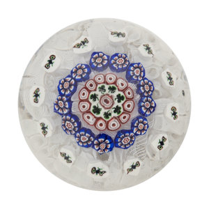 Appraisal: A Baccarat Concentric Patterned Shamrock and Butterfly Millefiori on Upset