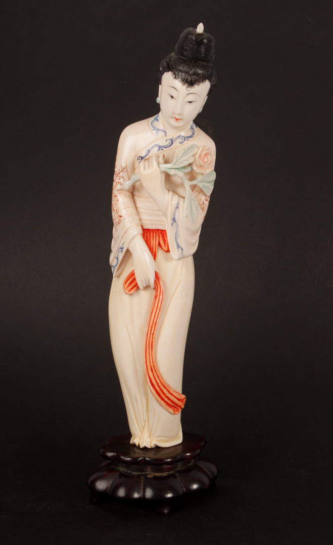 Appraisal: Chinese carved ivory Quan-Yin with polychrome highlights mounted on wood