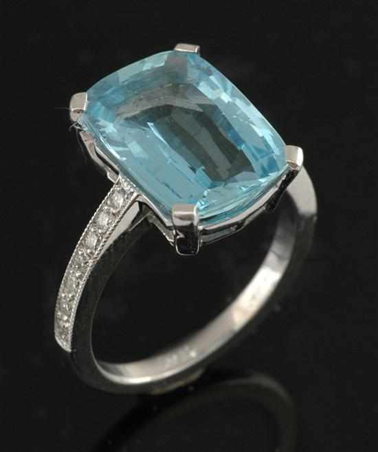 Appraisal: An aquamarine and diamond dress ring Centrally set with a