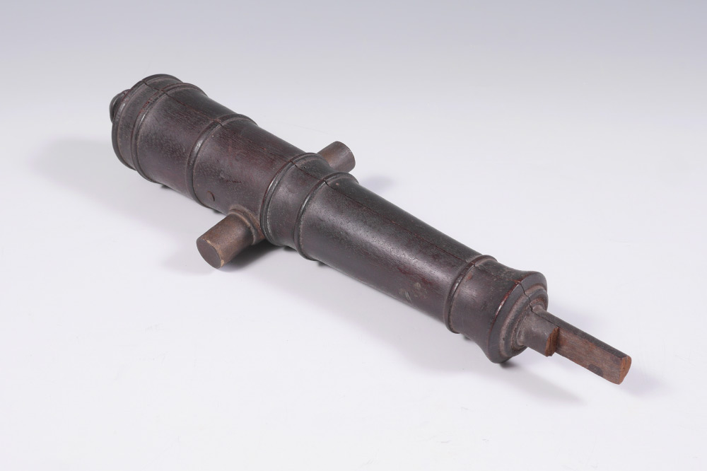 Appraisal: TH CENTURY WOOD CANNON MOLD Shaped wood mold used for