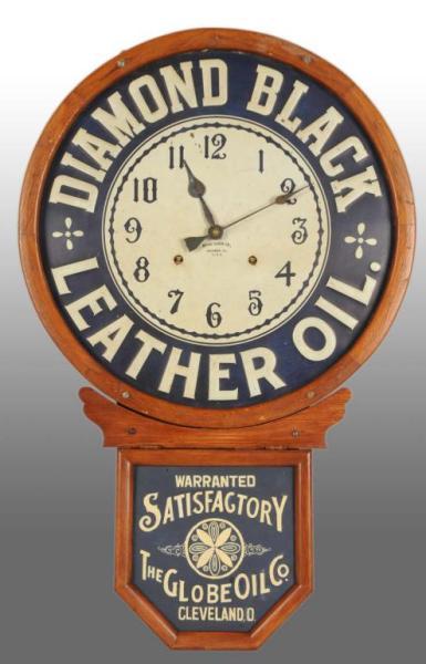 Appraisal: Baird Diamond Black Leather Oil Advertising Clock Description Circa Made