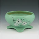 Appraisal: McCoy Spring Wood round footed planter in mint green Marked