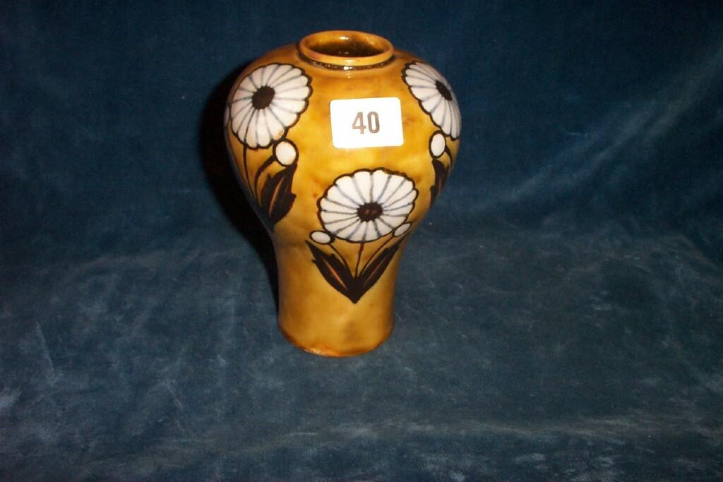 Appraisal: A Royal Doulton vase of shouldered form with stylised painted