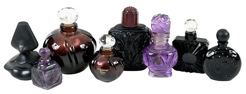 Appraisal: Eight Miniature Perfume Bottles comprising two amethyst colored molded glass