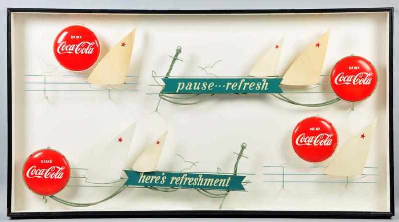 Appraisal: s - s Coca-Cola Sailboats Festoon Description Metal and plastic