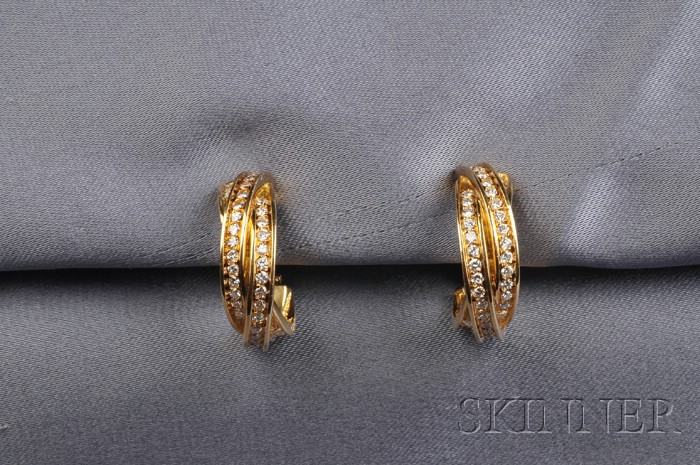 Appraisal: kt Gold and Diamond Earclips Cartier each designed as three