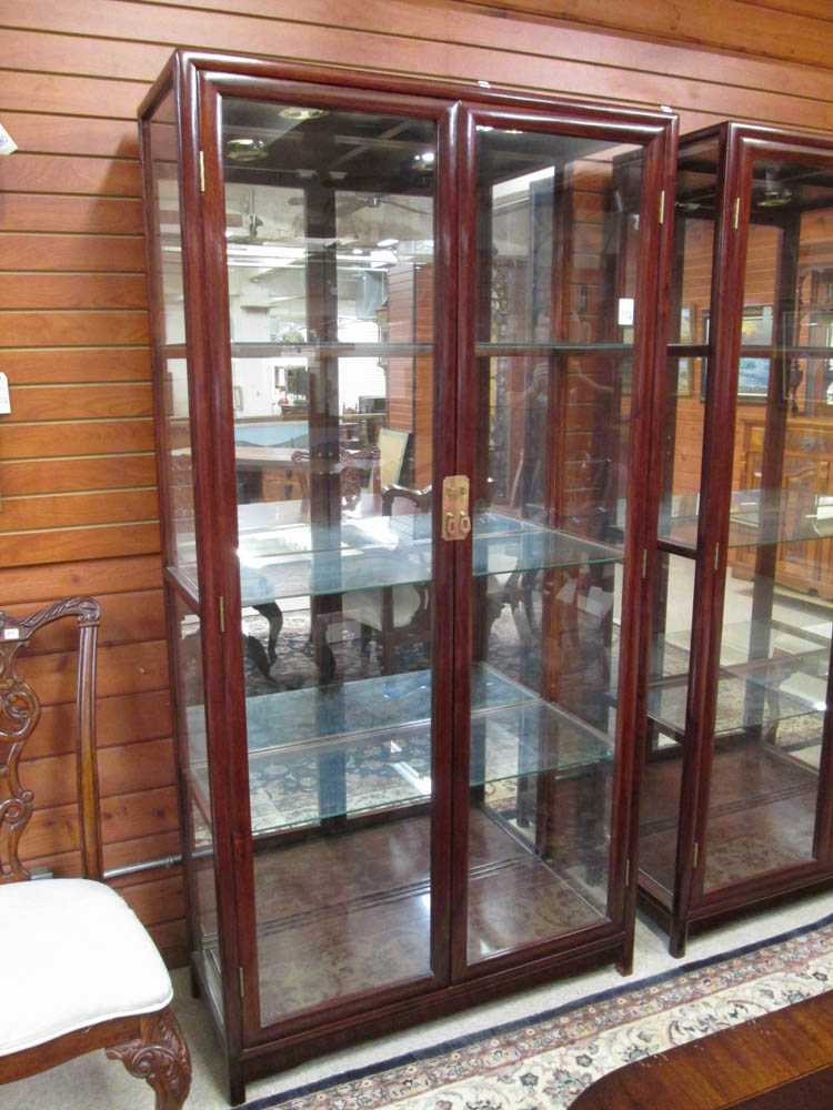 Appraisal: CHINESE GLASS AND ROSEWOOD ILLUMINATED DISPLAY CABINET having a full-length