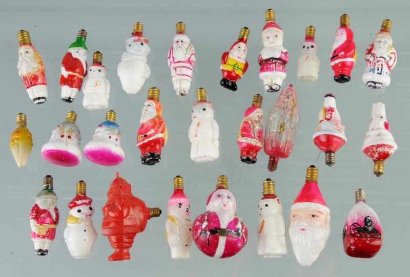 Appraisal: Lot of Figural Christmas Light Bulbs Description Includes Santas and