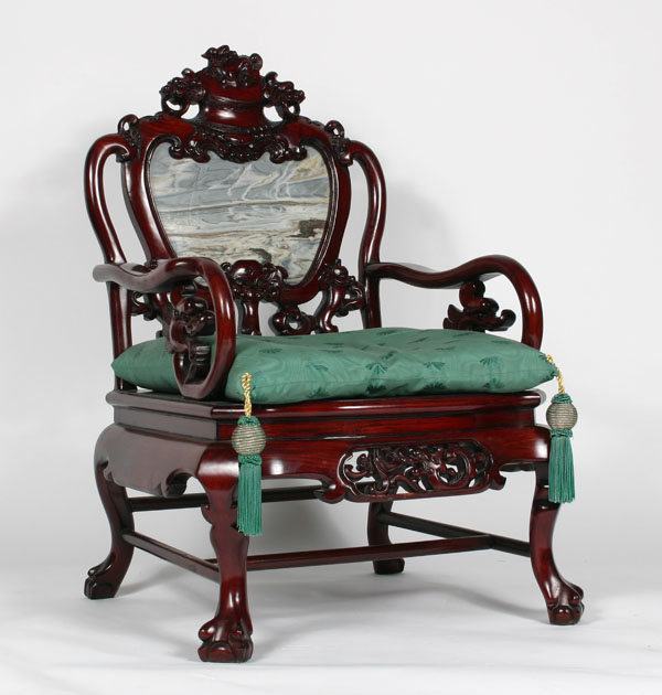 Appraisal: Chinese low chair with carved geometrics and mythical beasts stone