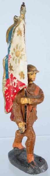 Appraisal: Elastolin Flagman with Composition Flag Flag of unknown origin Condition