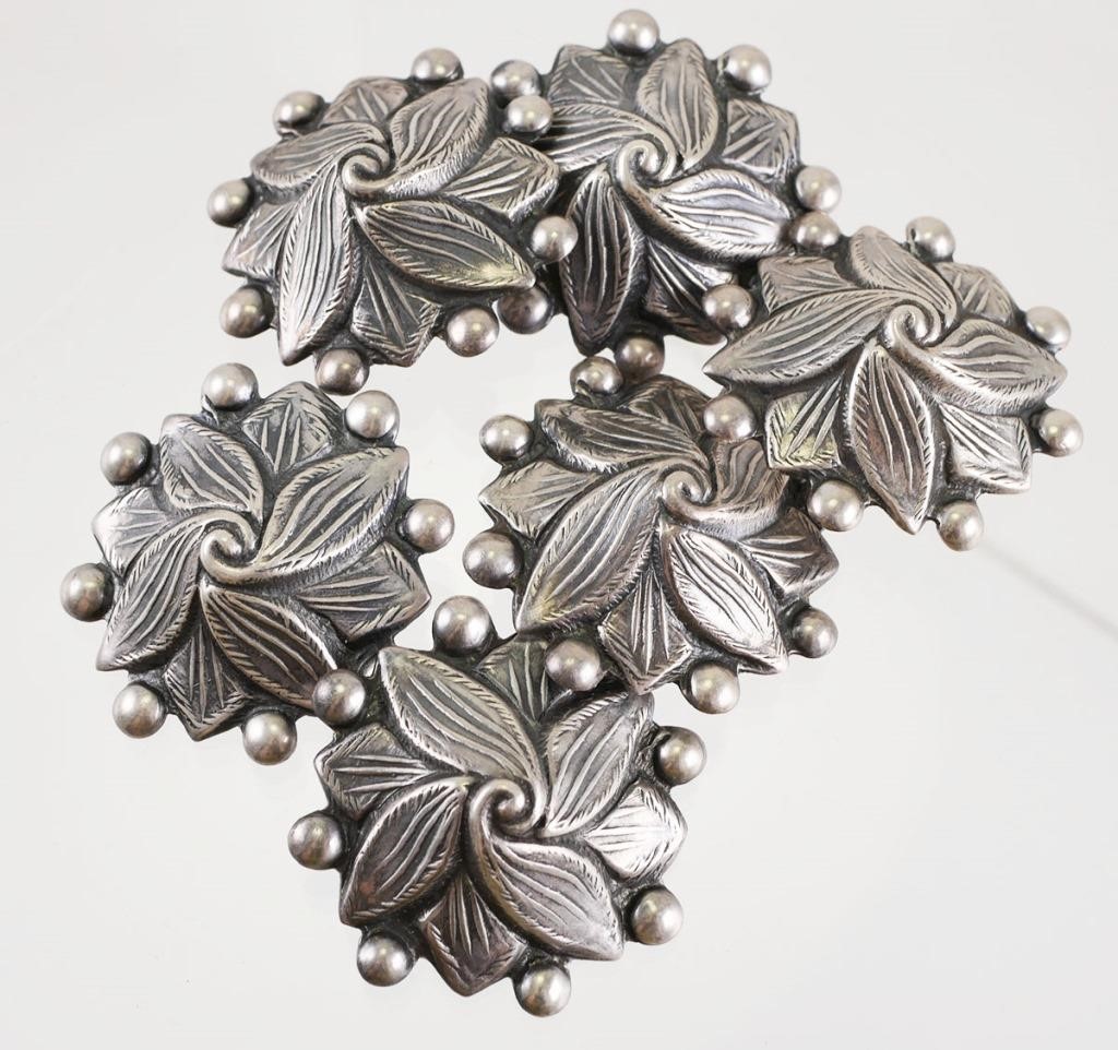 Appraisal: Six vintage Mexican sterling silver buttons design in the shape