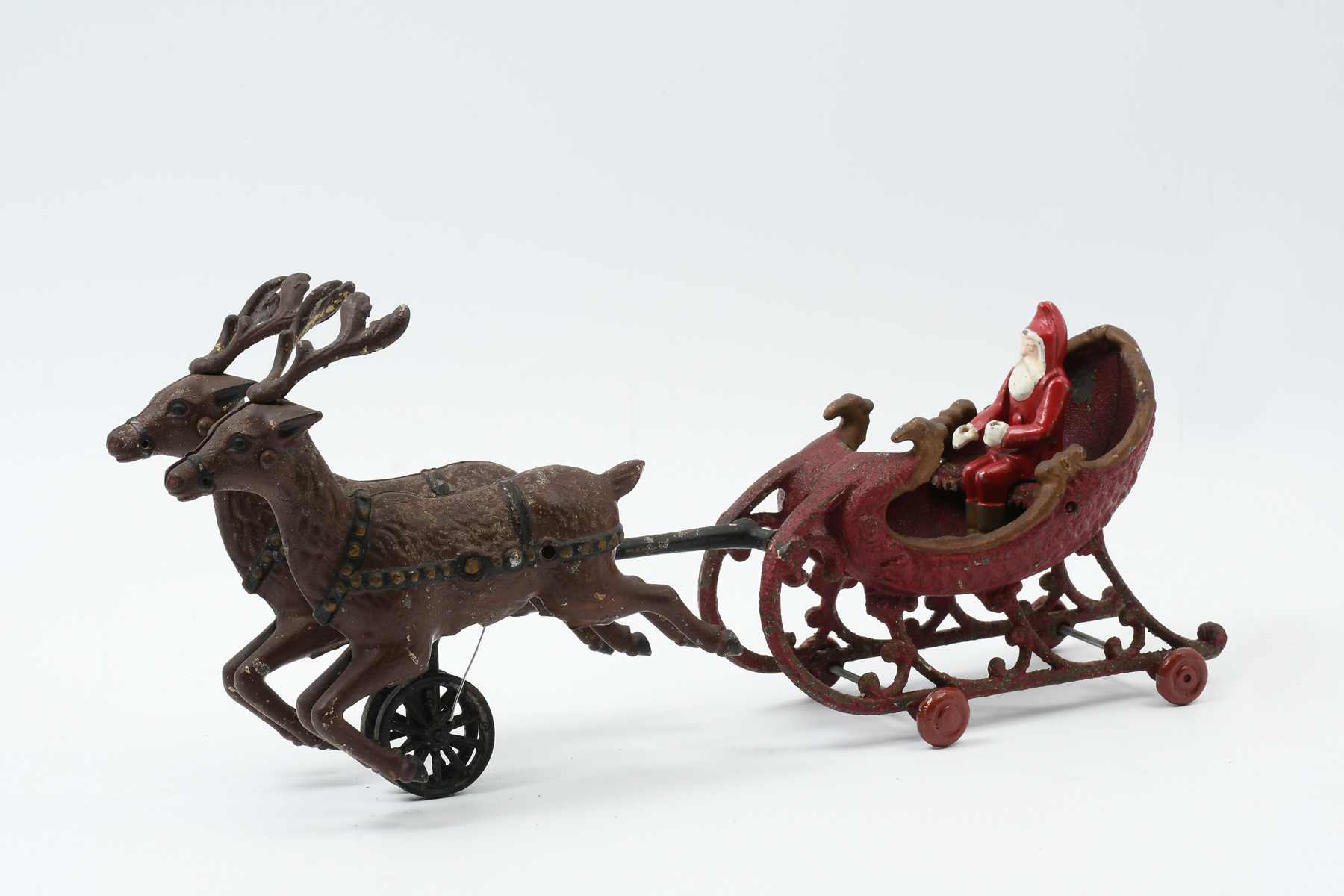 Appraisal: CAST IRON HUBLEY DOUBLE REINDEER SLEIGH Hubley Toy Company Pennsylvania