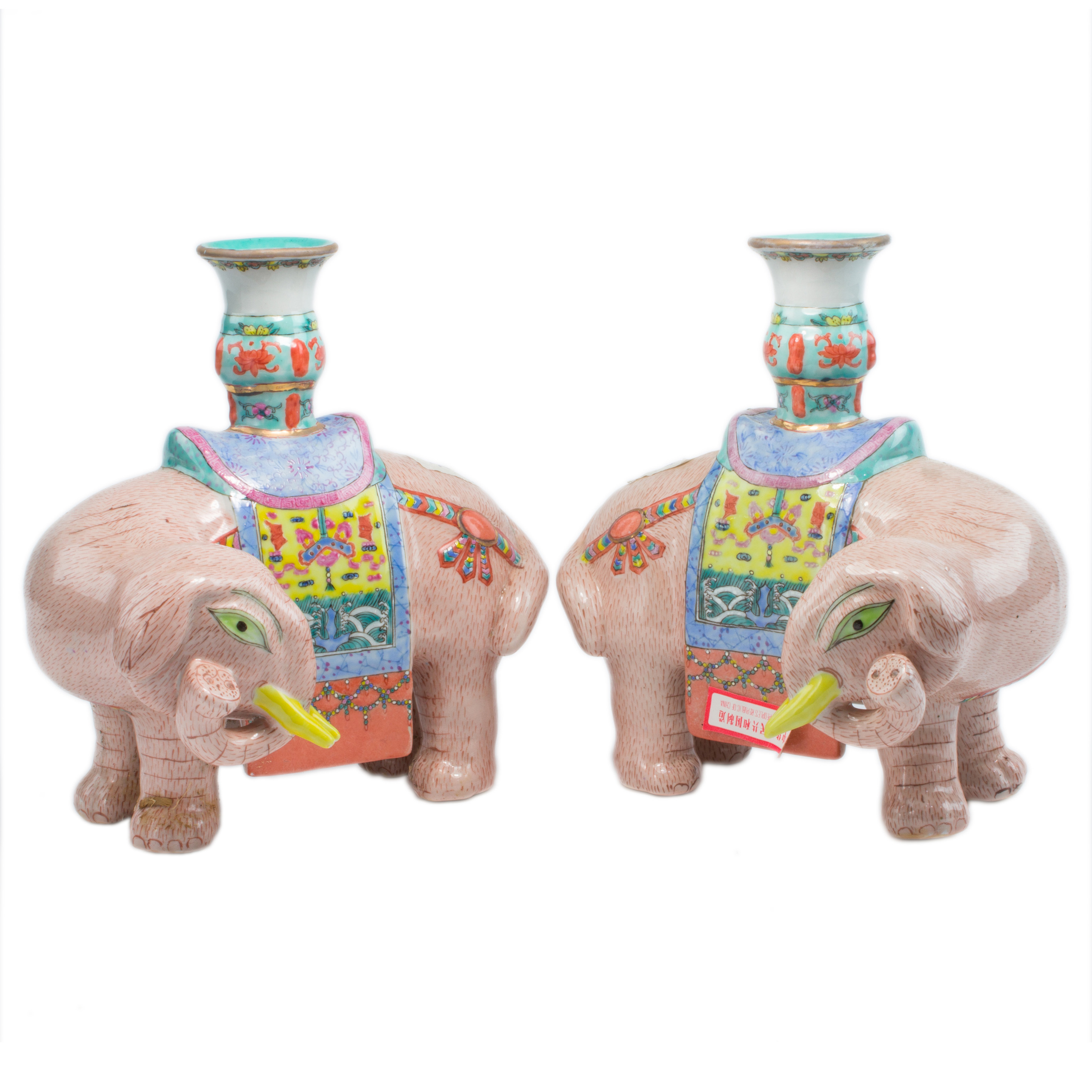 Appraisal: PAIR OF CHINESE FAMILLE ROSE ELEPHANT CANDLE HOLDERS Pair of