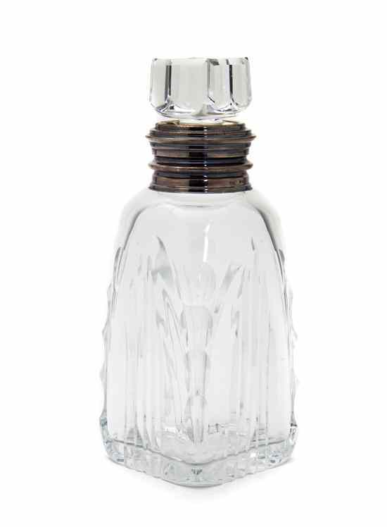 Appraisal: A Sterling Silver Mounted Glass Decanter having a faceted body