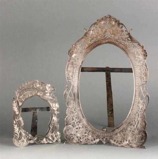 Appraisal: Two Middle Eastern engraved silver easel-back photo frames first half-