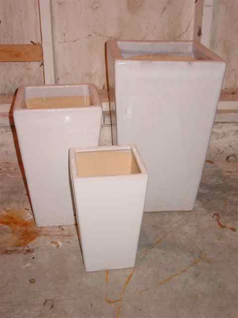 Appraisal: FIVE GRADUATED GLAZED POTTERY PLANTERS Largest h x w x