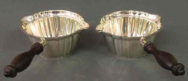 Appraisal: Pair of sterling silver Chippendale pattern sauce brandy warmers by