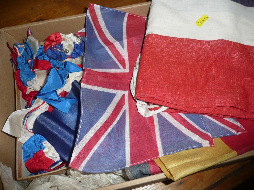 Appraisal: A quantity of union jacks - red white blue ribbons