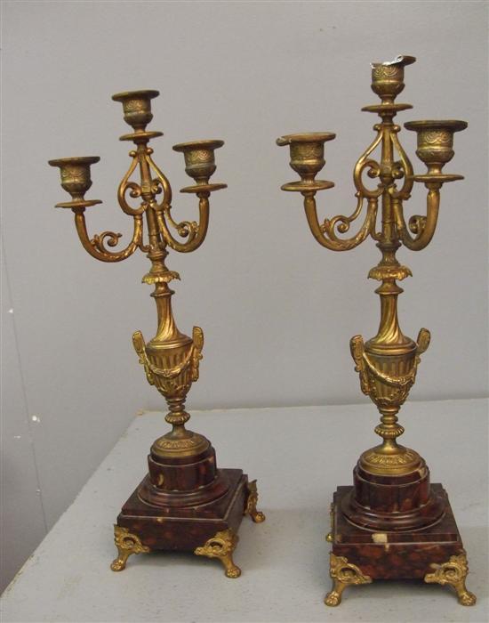 Appraisal: Pair of gilt metal and red marble two branch candelabra