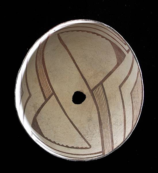 Appraisal: A Mimbres red-on-white bowl With a large-scale pattern of opposing