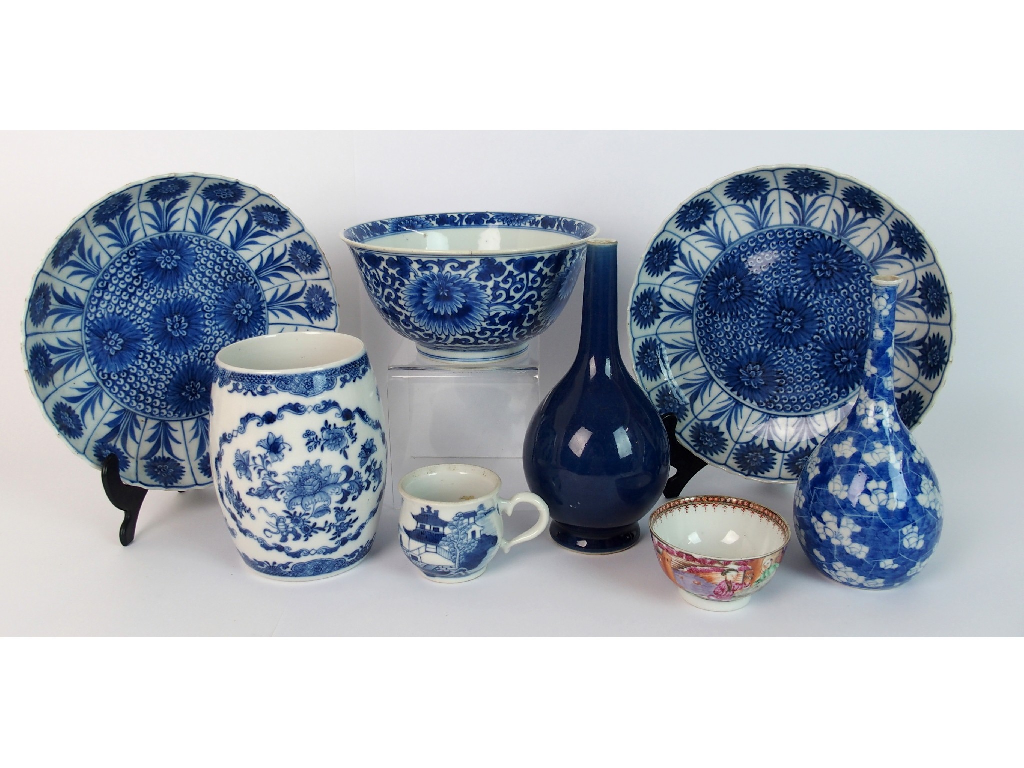 Appraisal: A Chinese export blue and white mugpainted with flowers repaired