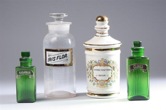 Appraisal: THREE GLASS AND ONE PORCELAIN BOTTLE Two green glass spice