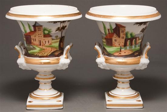 Appraisal: Pair of Porcelain de Paris painted parcel-gilt two-handled urns second