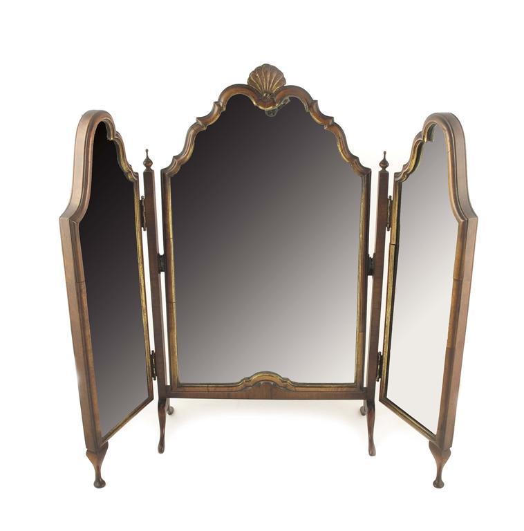 Appraisal: A walnut and parcel gilt triptych dressing table mirror