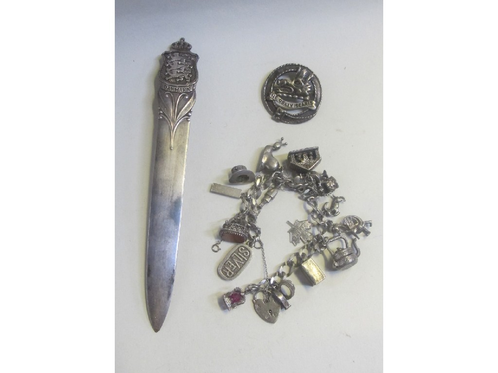 Appraisal: Lot comprising letter opener clan badge and a charm bracelet