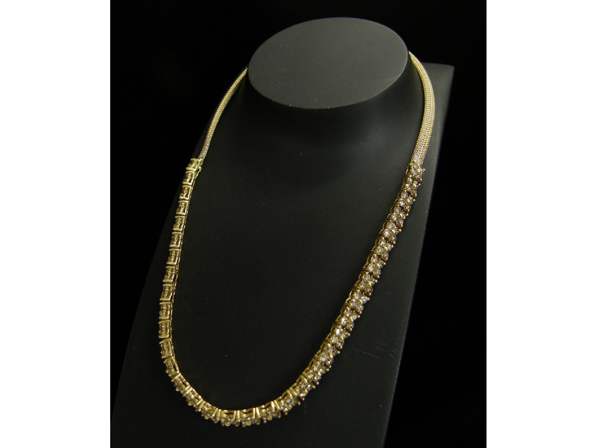 Appraisal: Attractive ct coloured diamond necklet set with thirty-four round brilliant-cut