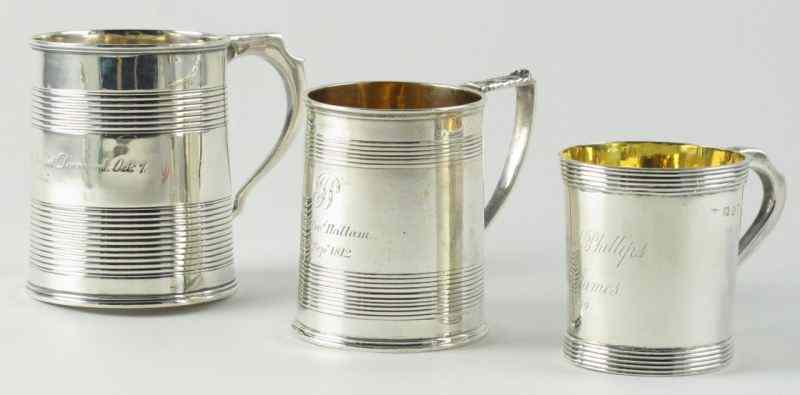 Appraisal: Three Georgian Silver Mugseach of barrel form with reeded decoration