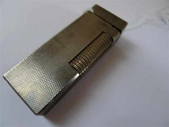 Appraisal: A DUNHILL LIGHTER TO A SILVER PLATED CASE