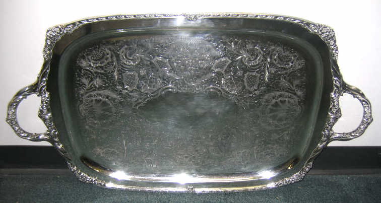 Appraisal: ROGERS PLATED SILVER SERVING TRAY Heritage pattern engraved interior surrounded