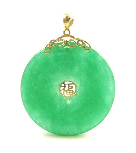 Appraisal: GREEN JADE AND FOURTEEN KARAT GOLD PENDANT The Good Luck