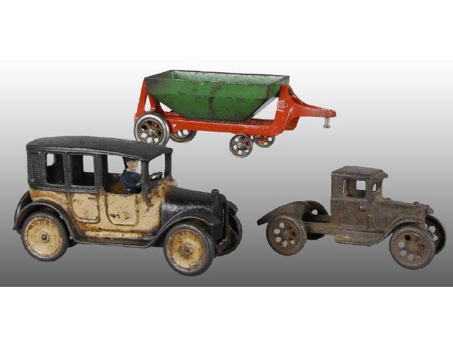 Appraisal: Lot of Toy Cast Iron Trucks with Trailer Description Model