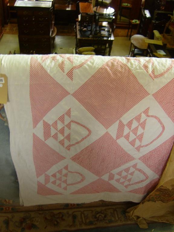 Appraisal: A th century hand worked bedspread with pink and white