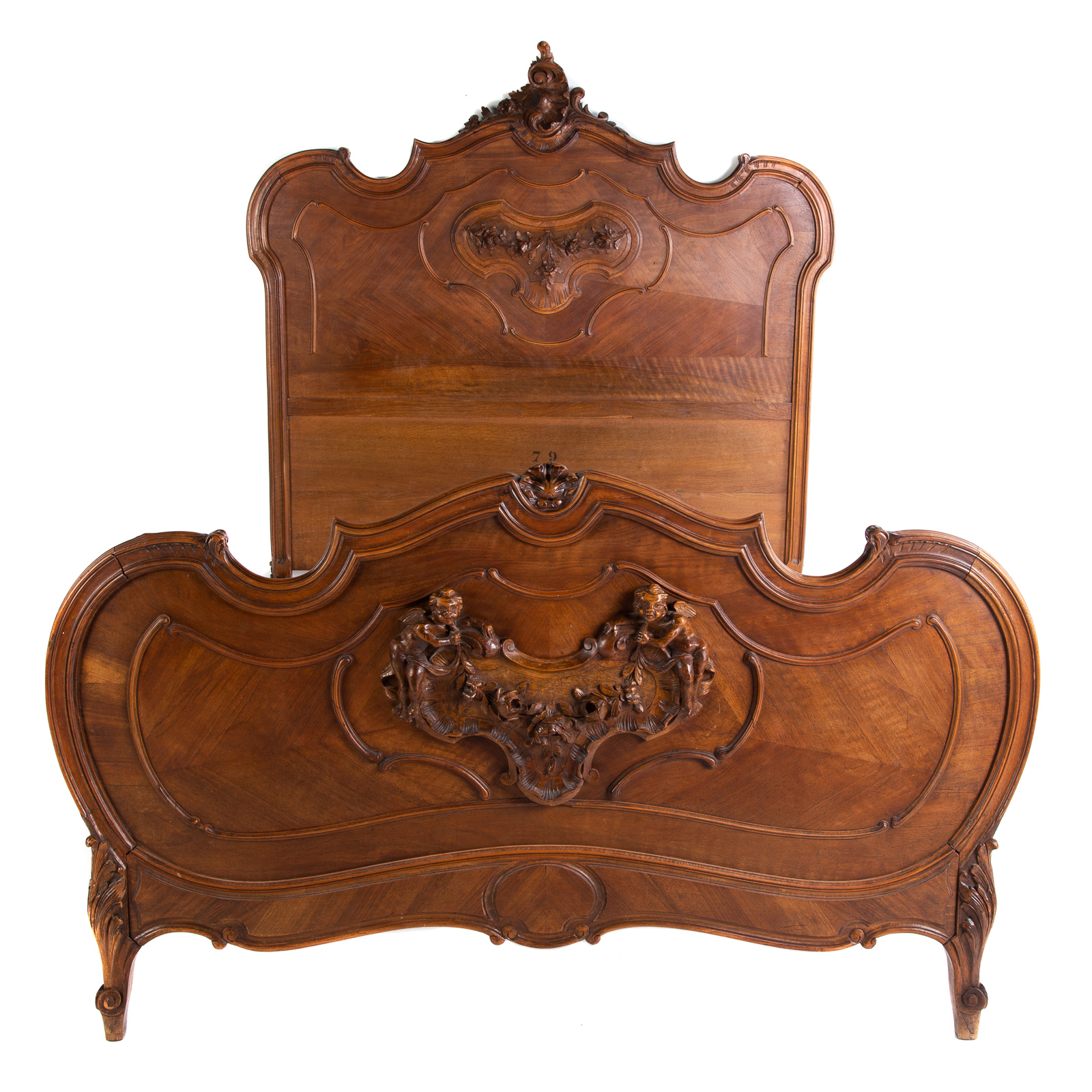 Appraisal: RENAISSANCE REVIVAL CARVED WALNUT BED Circa s with elaborate floral