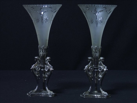 Appraisal: PAIR OF MERIDEN PLATED AND GLASS VASES Late th th