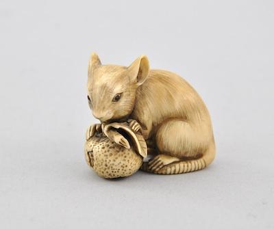 Appraisal: Netsuke of a Rat Nibbling Fruit by Ichi-gensai th Century